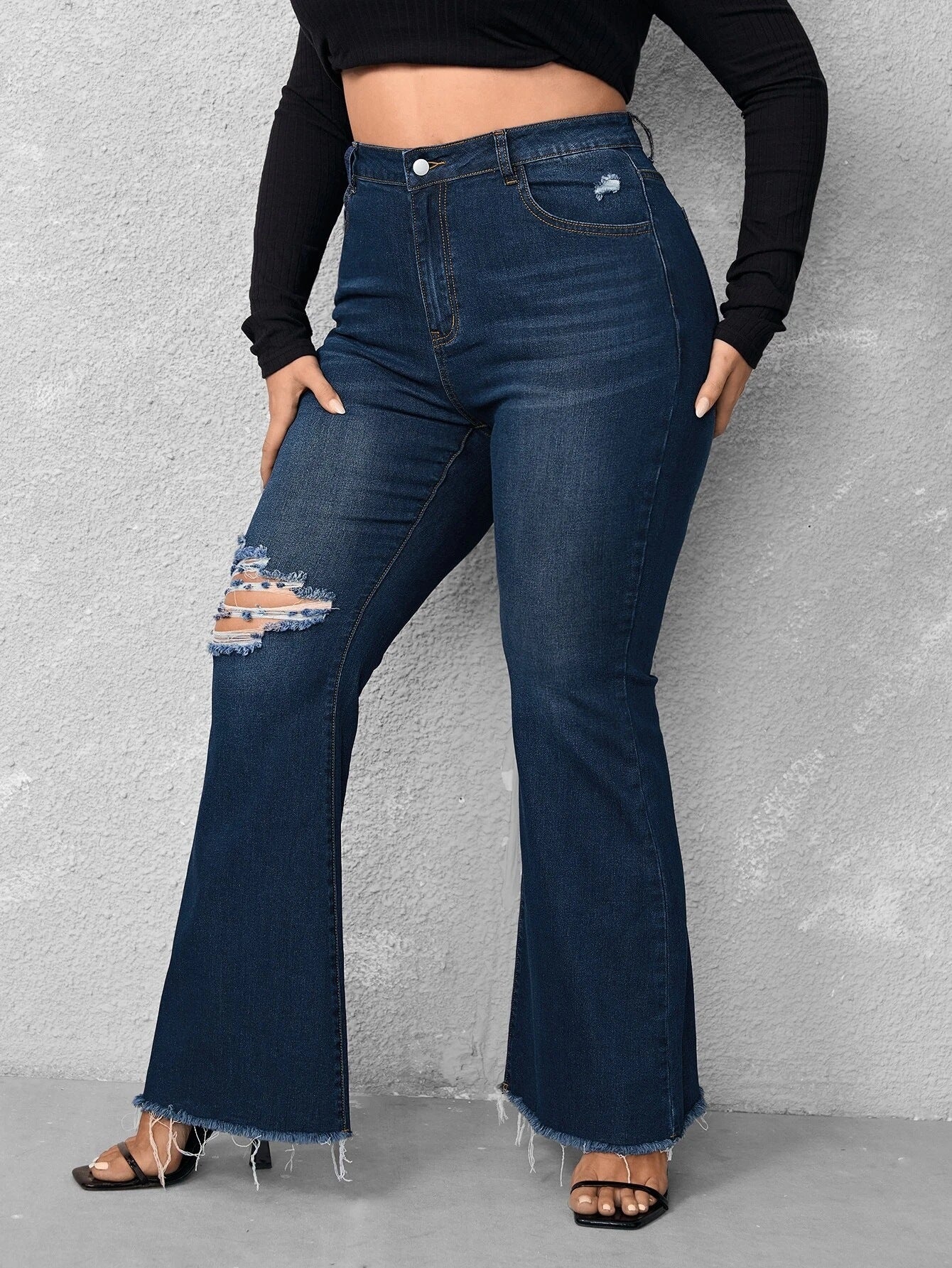 Woochic Pantalon grande taille évasé denim déchiré à bords bruts
