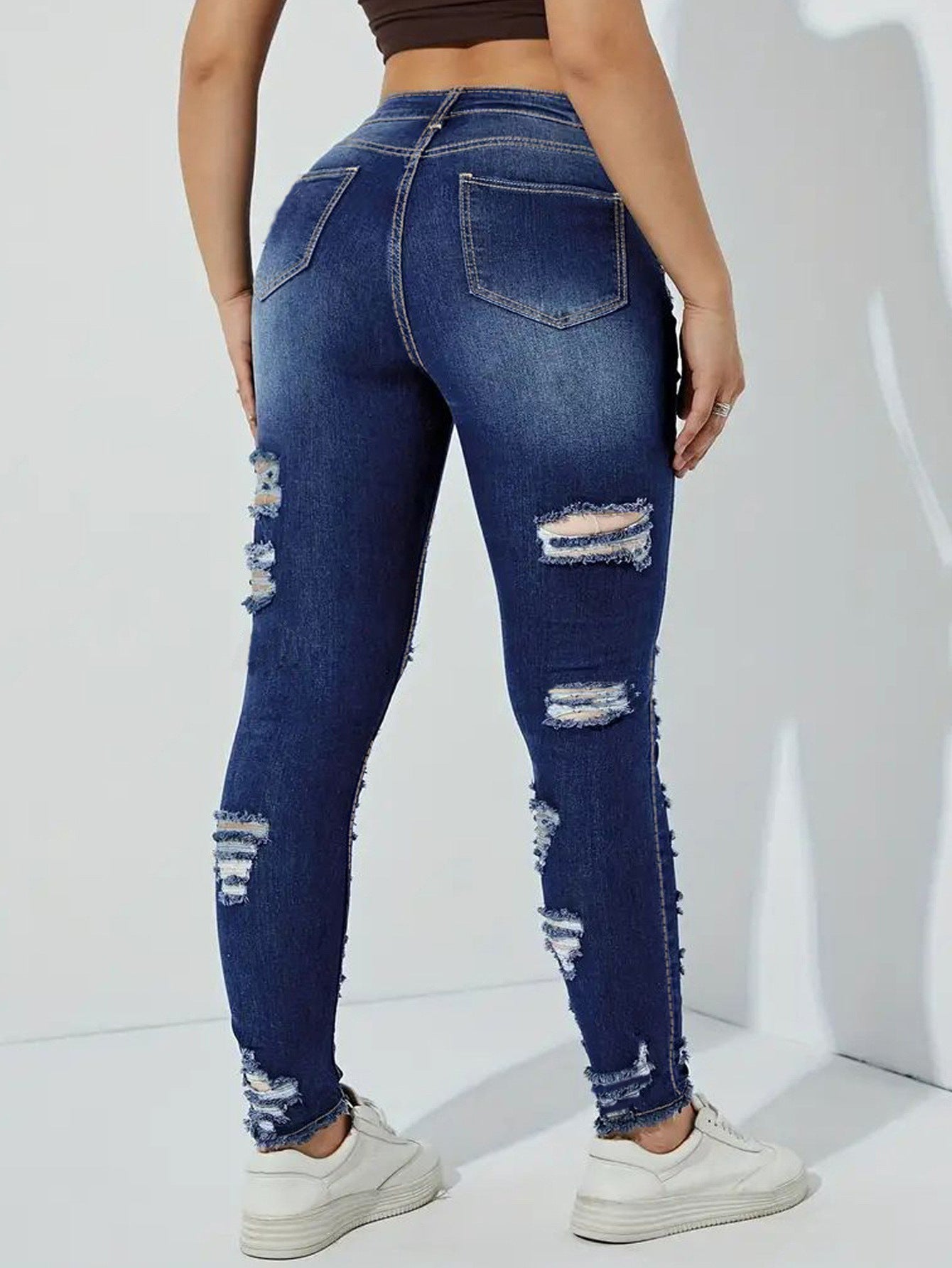 Woochic Pantalon grande taille mi-haut déchiré denim stretch à bords bruts
