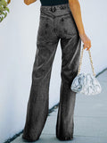 Woochic longue jeans fentes à la base flare évasé mi taille femme mode