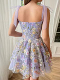 Woochic mini-robe tulle fleurie brodée bustier cocktail