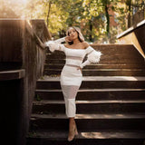 Woochic robe à plumes tricotée col bateau tulle dos nu