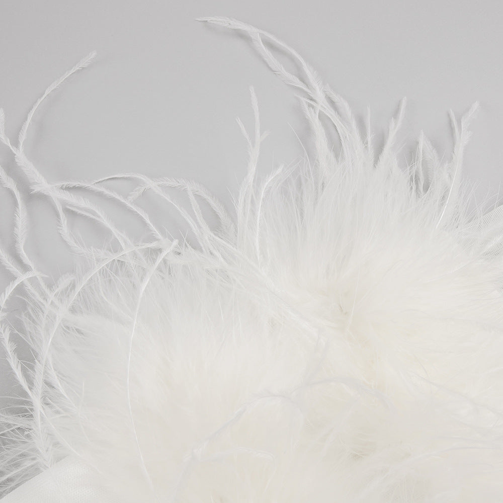 Woochic robe à plumes tricotée col bateau tulle dos nu