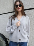 Woochic V-neck cardigan sweater with long sleeves and cutouts